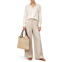 Bolso saco de rafia hecho a mano natural con asas de piel - ANOKHI