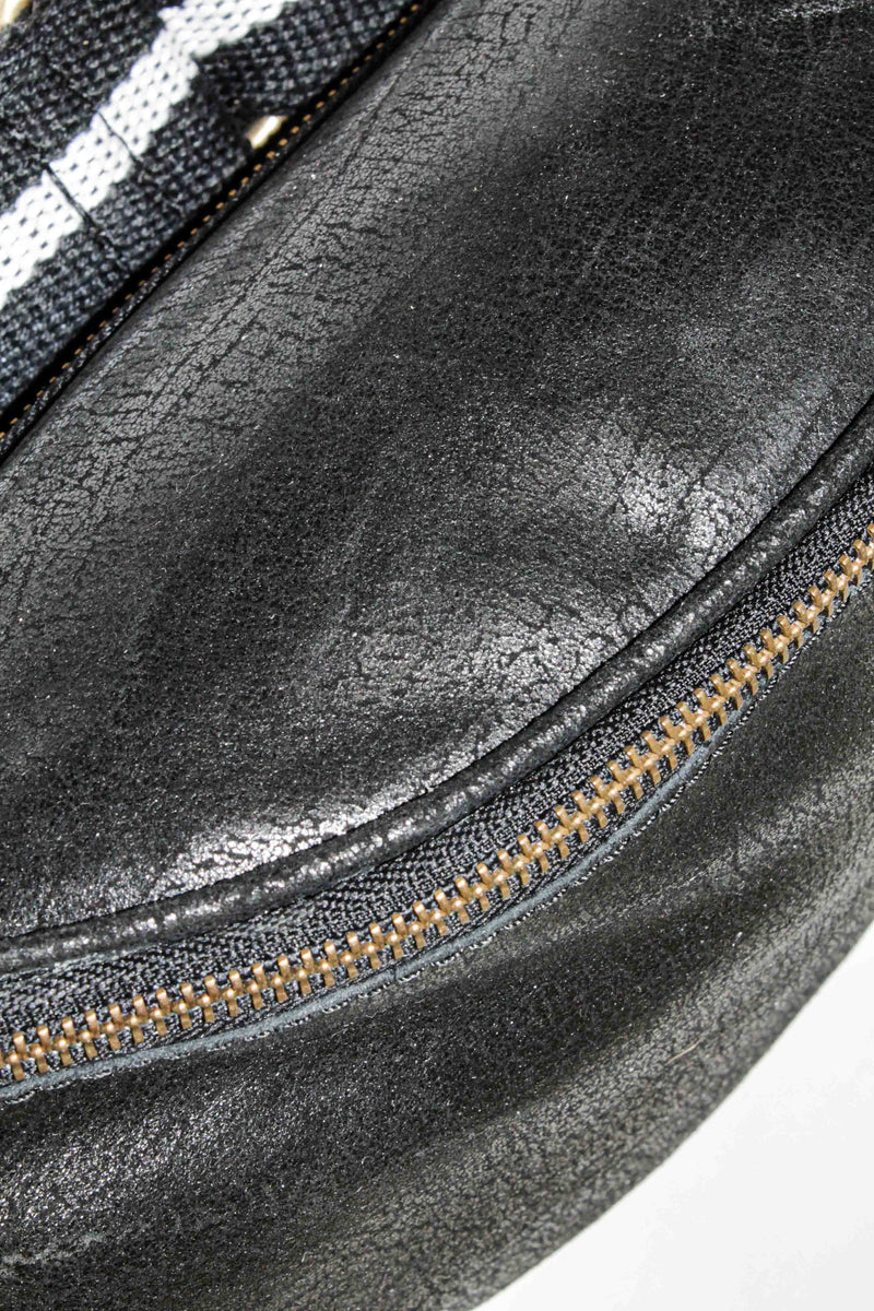 "Charlie L" in metallic black